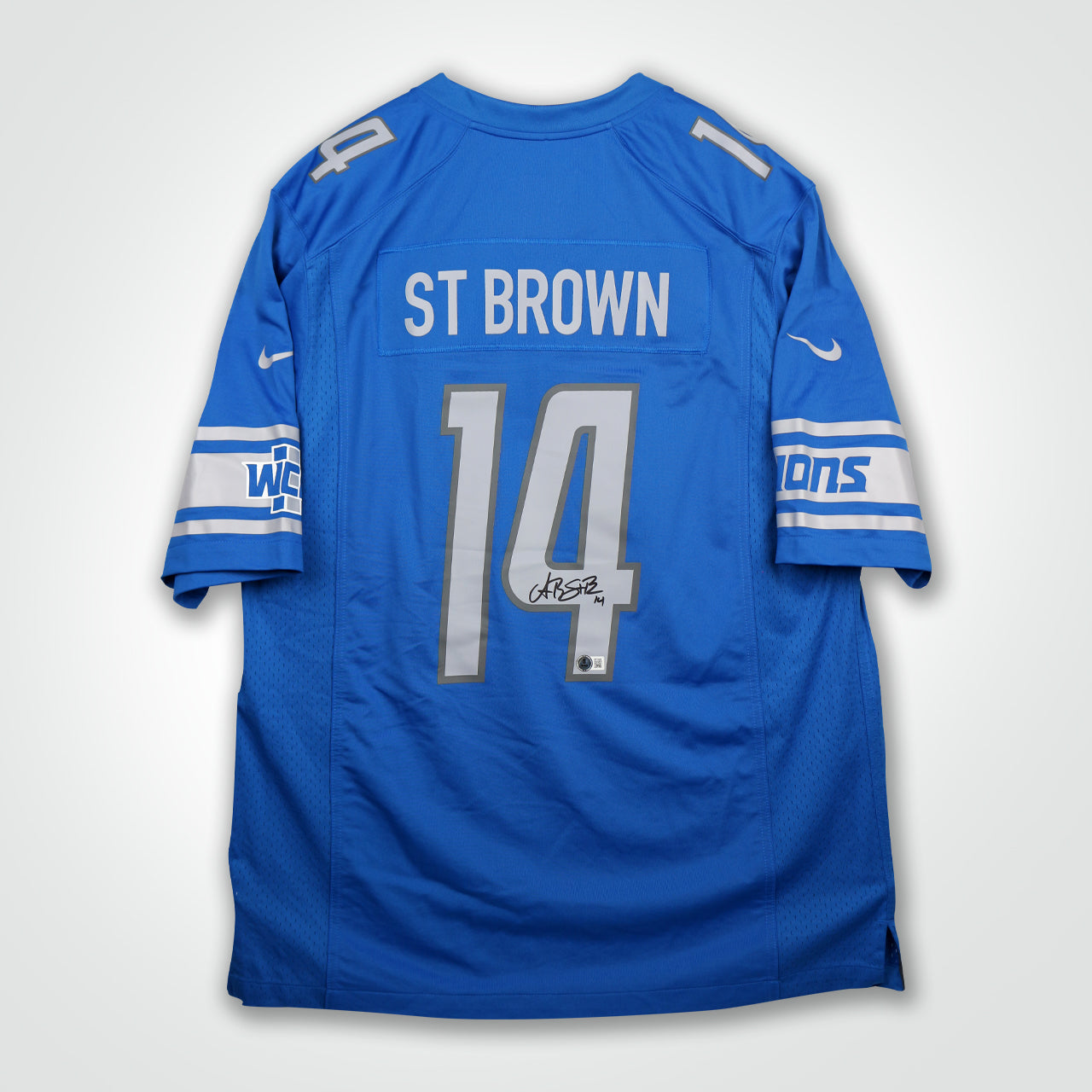 Amon-Ra St. Brown Signed Lions Nike Game Jersey - The Real Autograph